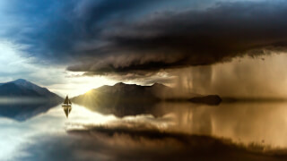 boat-out-at-sea-at-dusk