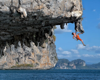 Chris Sharma climbs without ropes a.k.a. deep water solo. Photo by Wallpaper Safari