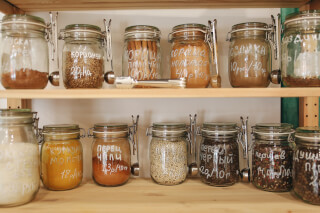 glass-jars-on-wooden-shelf