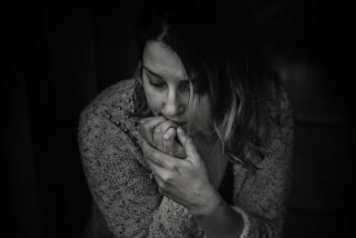 greyscale-photography-of-woman-wearing-long-sleeved-top