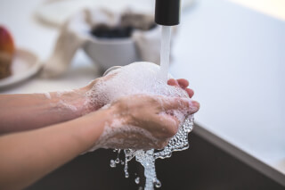 person-washing-his-hand