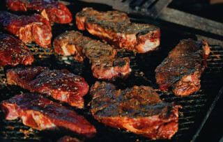 selective-focus-photography-of-meat-on-grill-v2