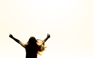 silhouette-of-woman-happy-dance