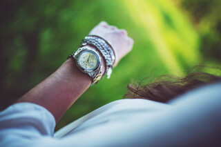 silver-watch-on-the-girl-s-arm-present